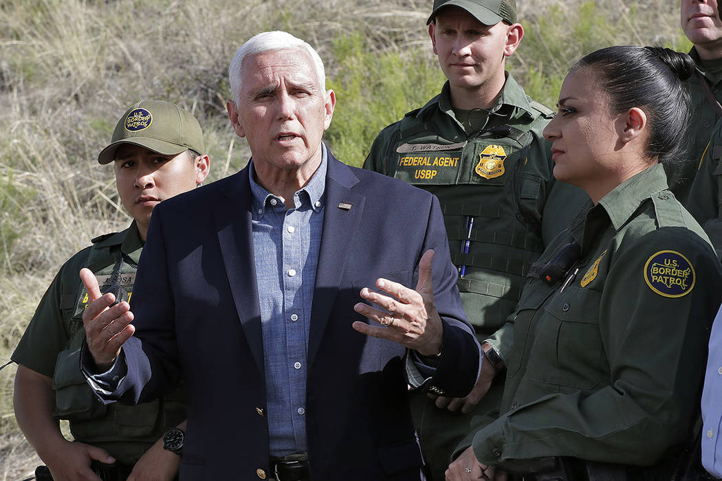 FILE--Vice President Mike Pence speaks along the International border while meeting with border ...