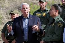 FILE--Vice President Mike Pence speaks along the International border while meeting with border ...