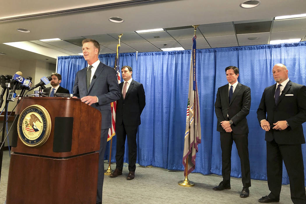 US attorney David Anderson announces criminal spy charges against a San Francisco Bay Area tour ...