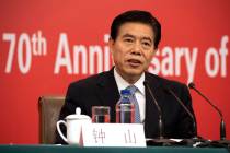 Chinese Commerce Minister Zhong Shan speaks during a press conference on the sidelines of the u ...