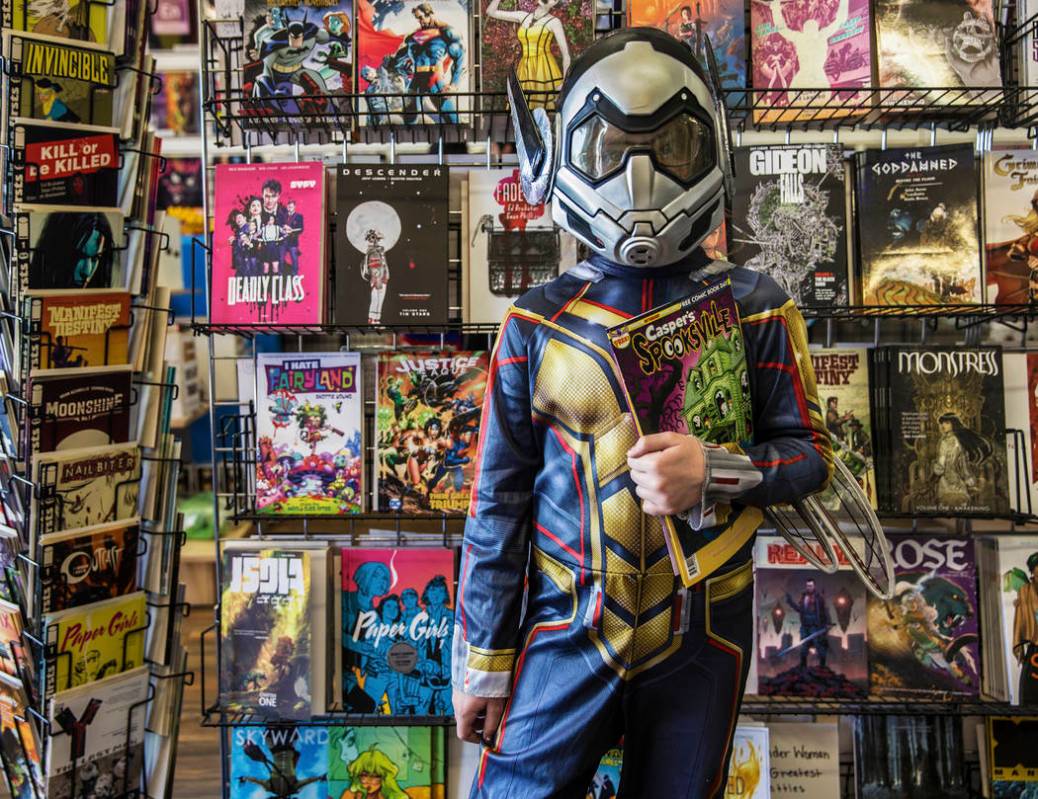 Emma Lee, 8, dressed as The Wasp, during free comic book day at Cosmic Comics on Saturday, May, ...