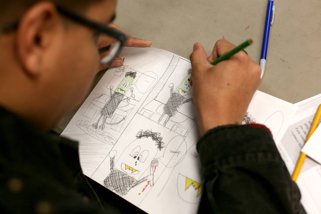 Rodrigo Blotte draws a comic at the class of the Maximum League of Aspiring Artists at Maximum ...