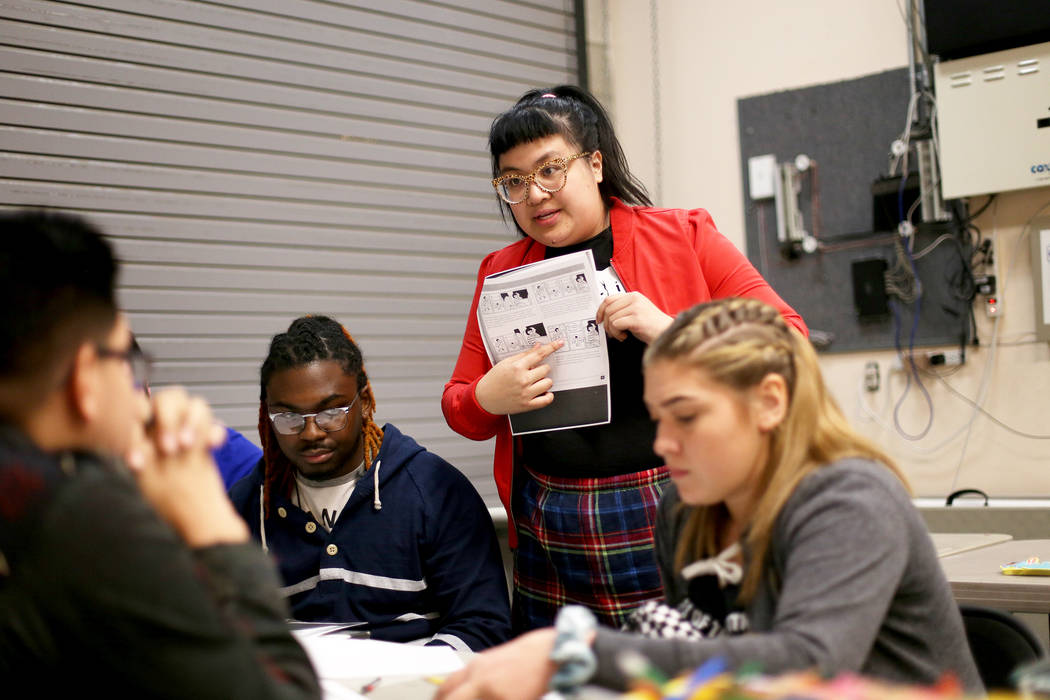 Artist and publisher Jean Munson speaks to students at a class of the Maximum League of Aspirin ...