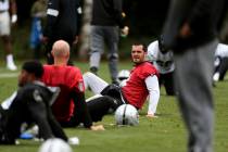 Oakland Raiders quarterback Derek Carr attends a training session during the media day at The G ...