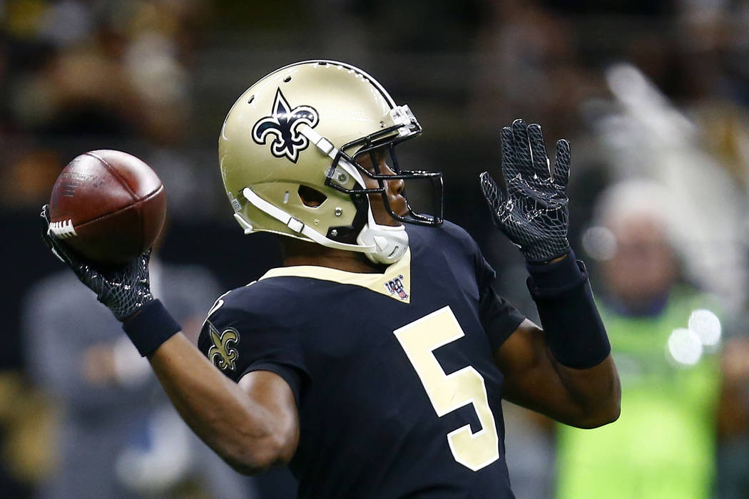 New Orleans Saints quarterback Teddy Bridgewater (5) throws in the first half of an NFL footbal ...