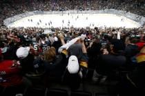 FILE - In this May 28, 2018, file photo, fans celebrate a goal by Vegas Golden Knights left win ...