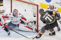 Golden Knights center William Karlsson (71) scores a first-period goal against Capitals goalten ...