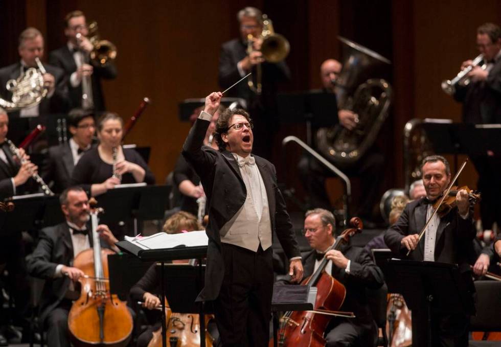 Music Director Donato Cabrera salutes the audience before the start of a performance by the Las ...