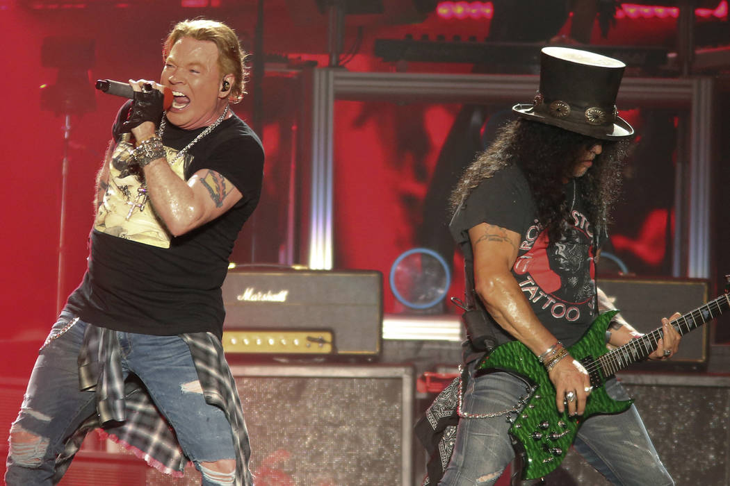 Guns N' Roses' Axl Rose, left, and Slash perform on the first weekend of the Austin City Limits ...