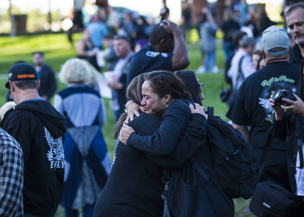 Route 91 Harvest festival shooting survivors Gloria Noble of Los Angeles, center right, and Con ...