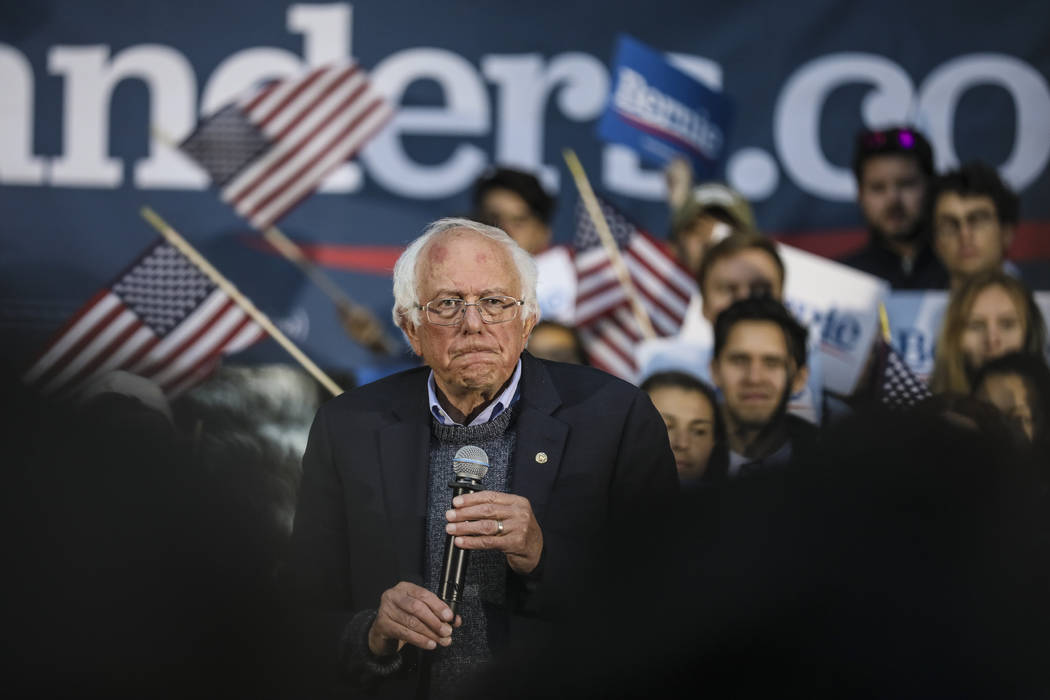 Democratic presidential candidate Sen. Bernie Sanders, I-Vt., pauses while speaking at a campai ...