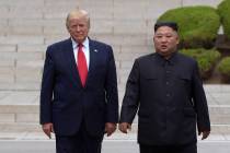 In a June 30, 2019, file photo, U.S. President Donald Trump, left, meets with North Korean lead ...
