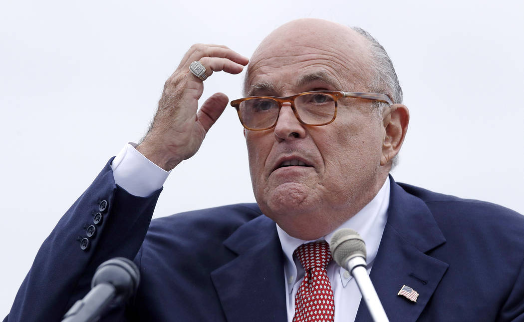 In an Aug. 1, 2018, file photo, Rudy Giuliani, attorney for President Donald Trump, addresses a ...