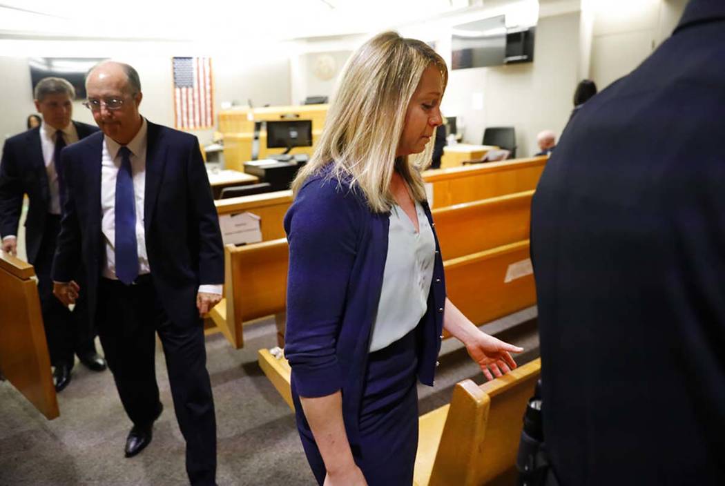 Fired Dallas police officer Amber Guyger leaves the courtroom after a jury found her guilty of ...
