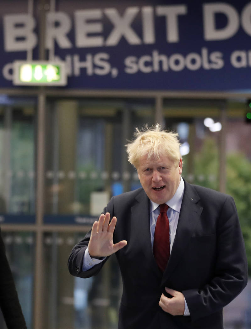 Britain's Prime Minister Boris Johnson arrives for interviews at the Conservative Party Confere ...