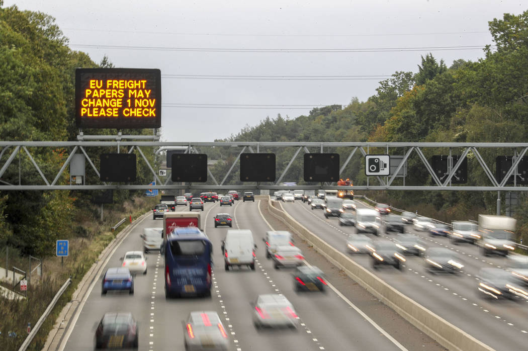 A motorway overhead matrix sign on the M3 motorway warms motorists about possible changes to EU ...