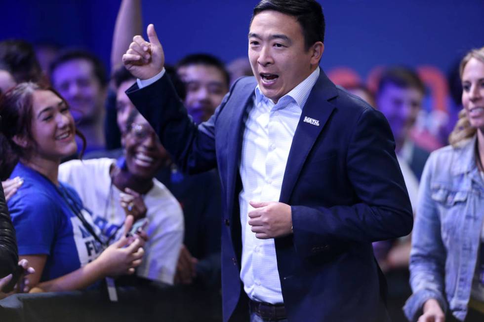 Democratic presidential candidate Andrew Yang leaves the stage after participating during the 2 ...