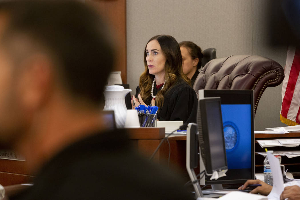 Clark County District Judge Jacqueline Bluth presides over a hearing for Ashley Fargo and Henry ...