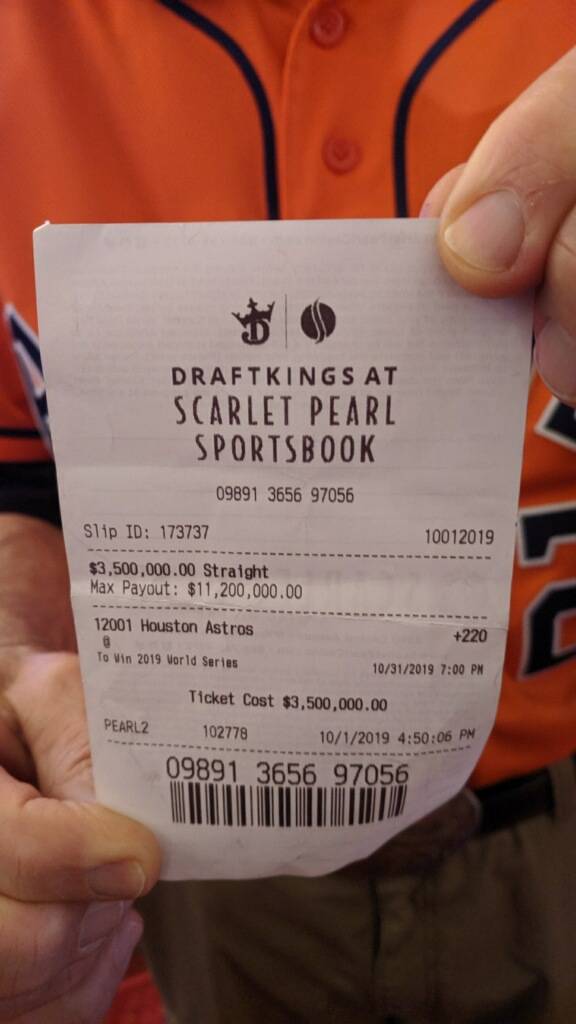Jim “Mattress Mack” McIngvale holds his ticket after making a $3.5 million wager to win $7. ...