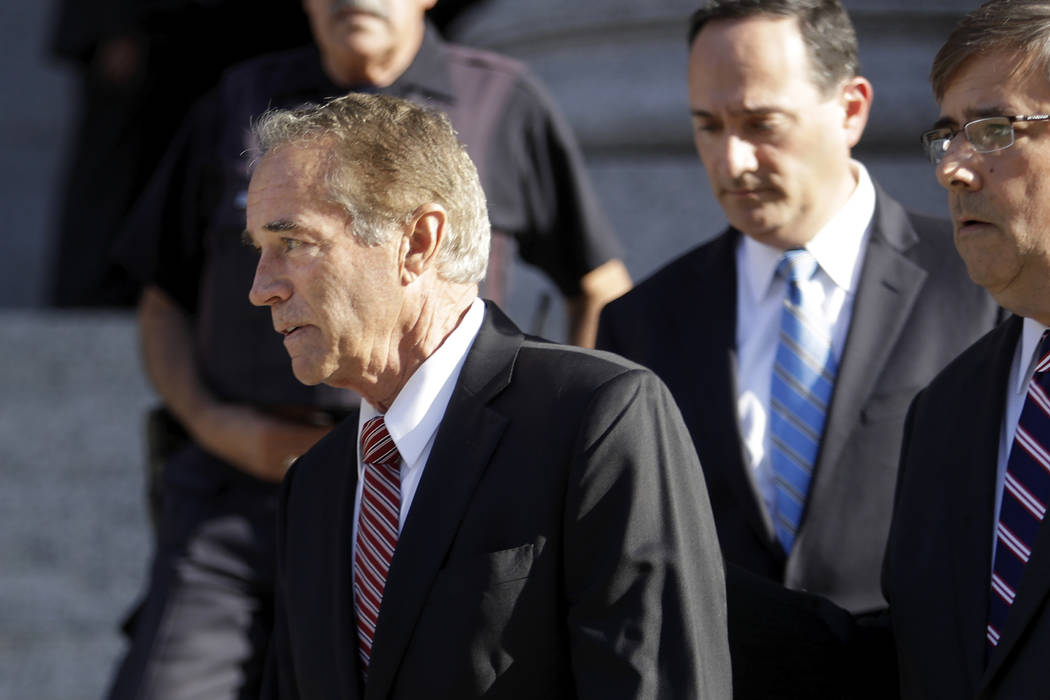 Former U.S. Rep. Chris Collins leaves federal court, Tuesday, Oct. 1, 2019, in New York. Collin ...