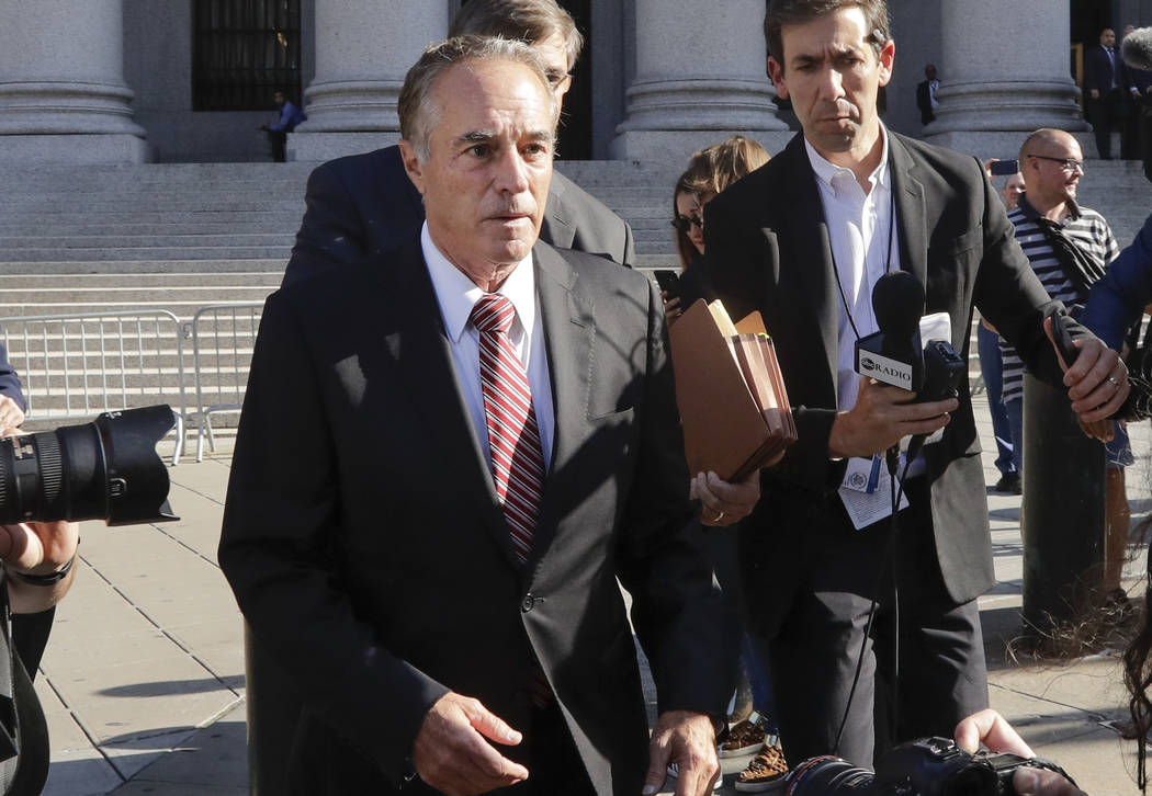 Former U.S. Rep. Chris Collins leaves federal court Tuesday, Oct. 1, 2019, in New York. Collins ...