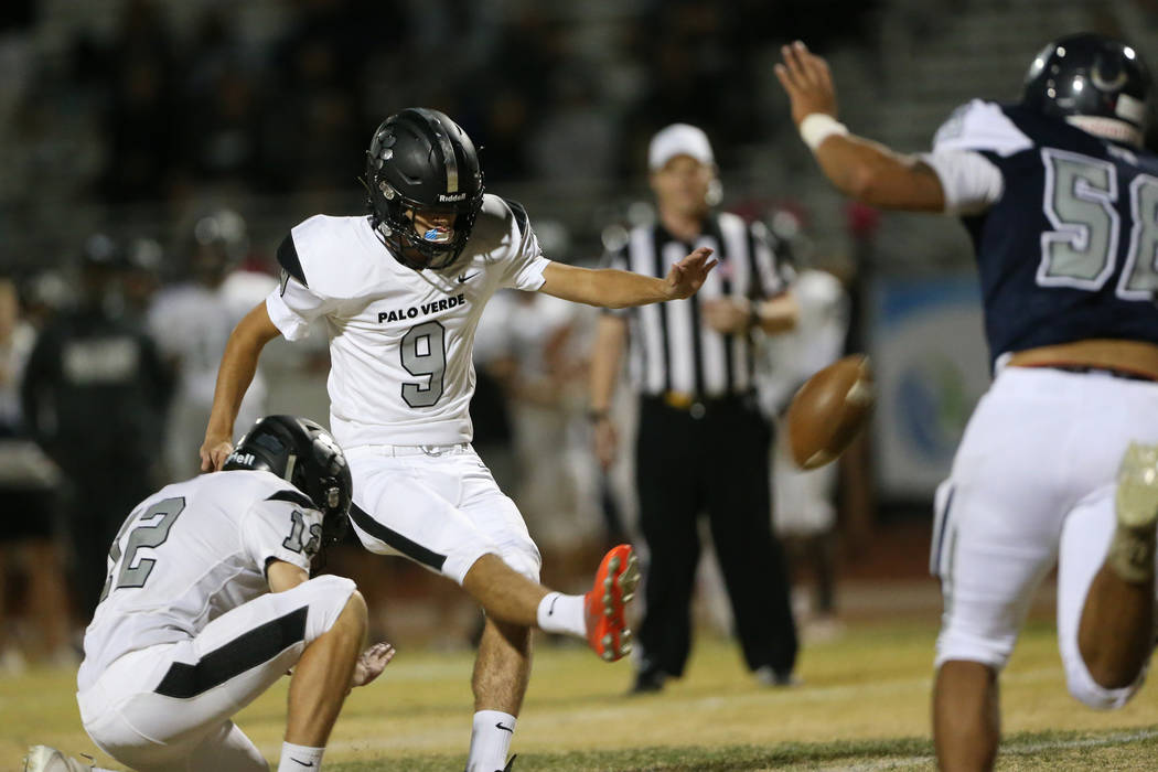 Palo Verde's Zach Moore (9) kicks the winning extra point of the game with Jacob Gosz-Siqueiros ...