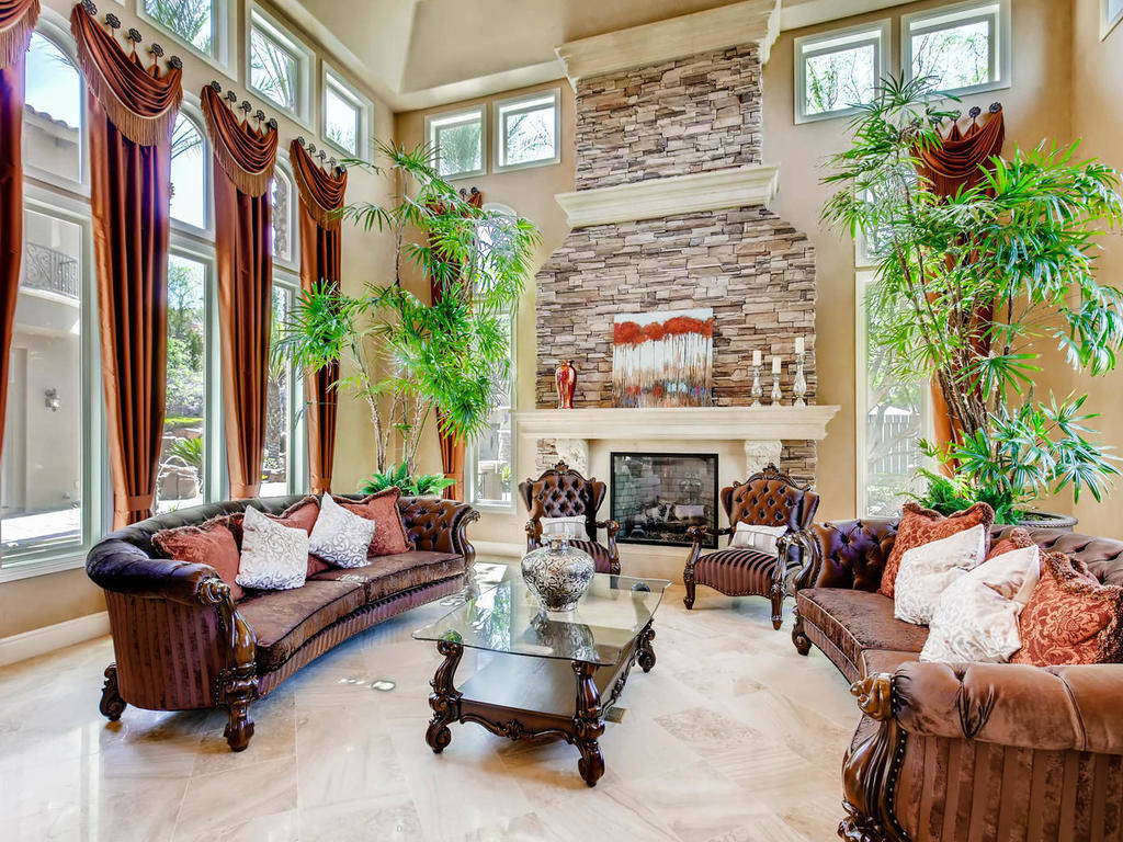 A fireplace is the center of the expansive living room.