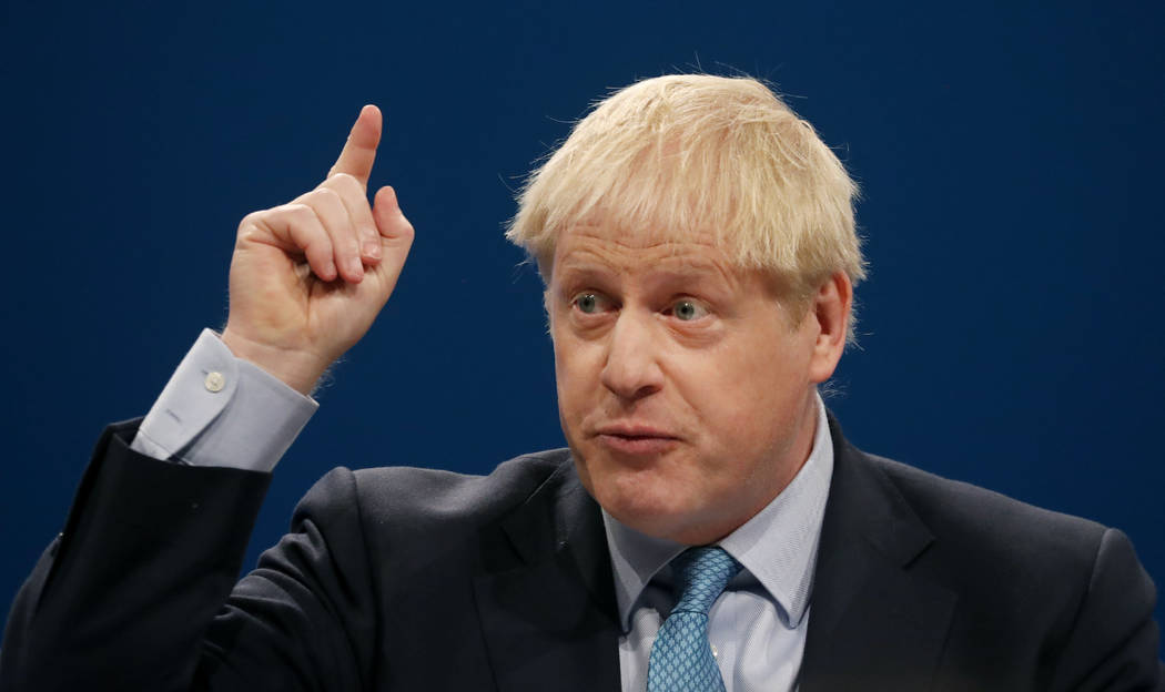 Britain's Prime Minister Boris Johnson delivers his Leader's speech at the Conservative Party C ...