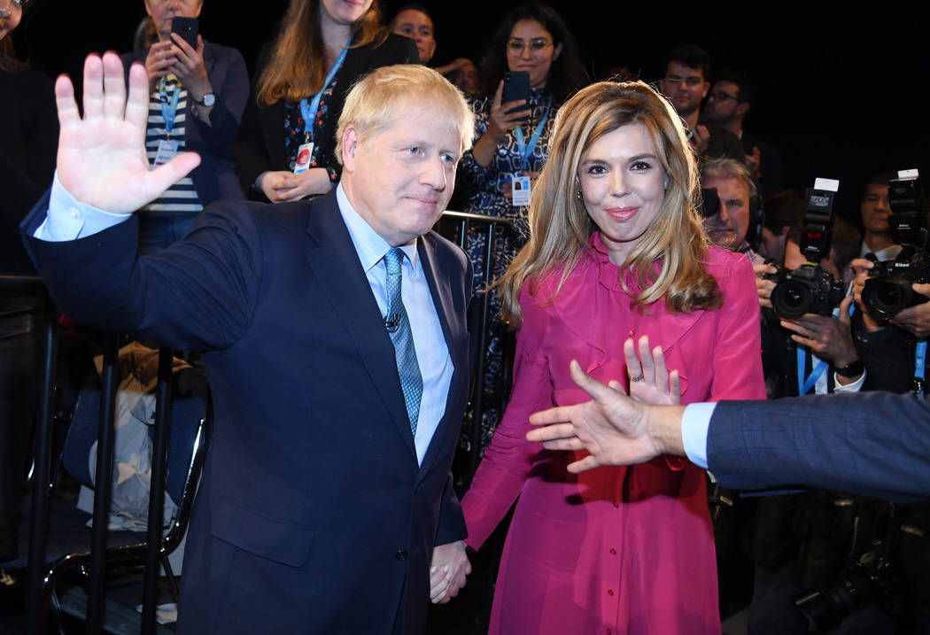 Britain's Prime Minister Boris Johnson leaves the stage after he finishes his Leader's speech a ...