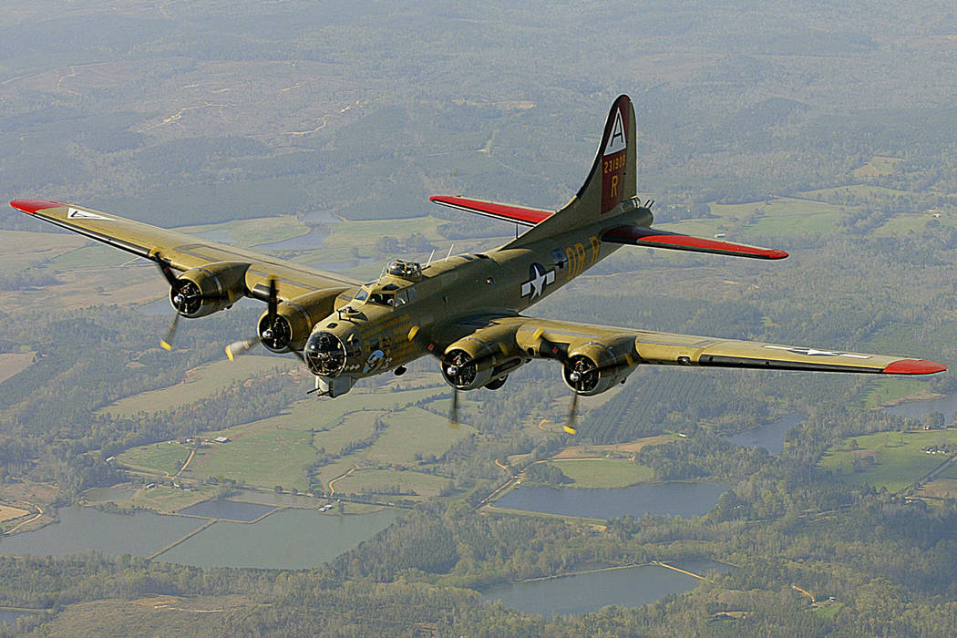 FILE - In this April 2, 2002, file photo, the Nine-O-Nine, a Collings Foundation B-17 Flying Fo ...