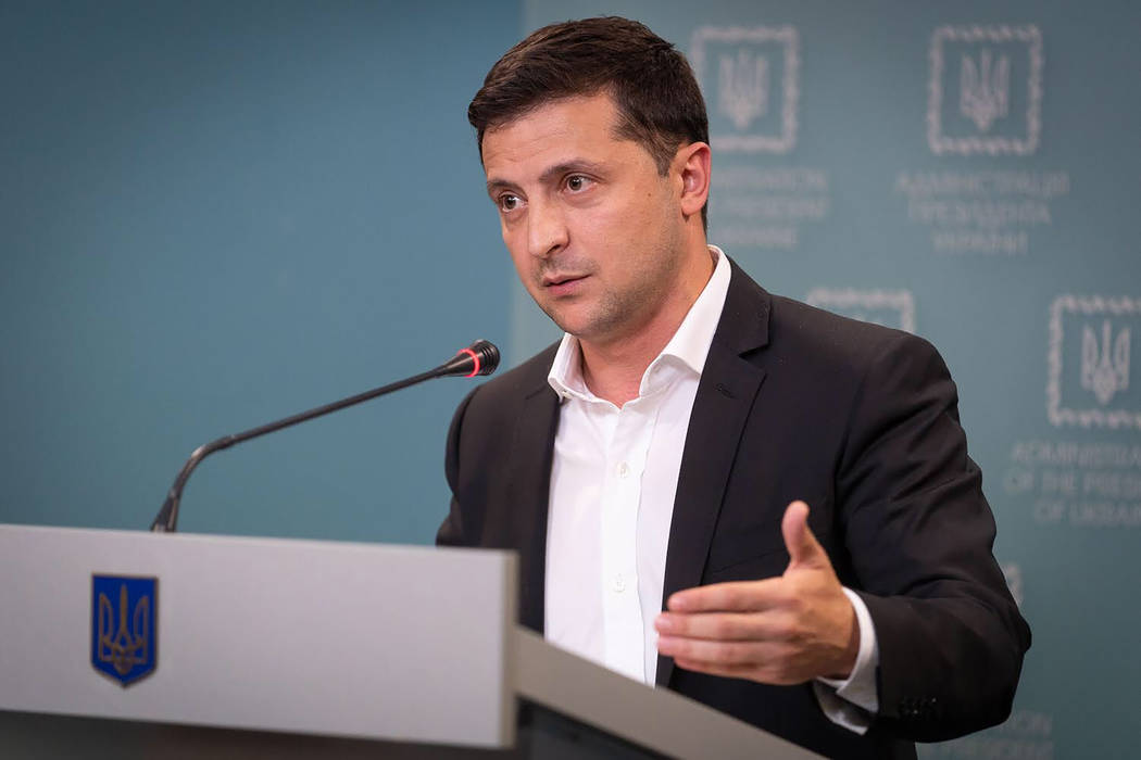 Ukrainian President Volodymyr Zelenskiy speaks to media during his press conference in Kyiv, Uk ...