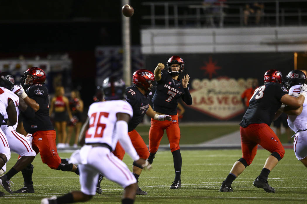 UNLV Rebels quarterback Kenyon Oblad (7) throws a pass during the second half of an NCAA footba ...