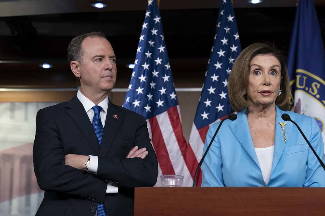 Speaker of the House Nancy Pelosi, D-Calif., is joined by House Intelligence Committee Chairman ...