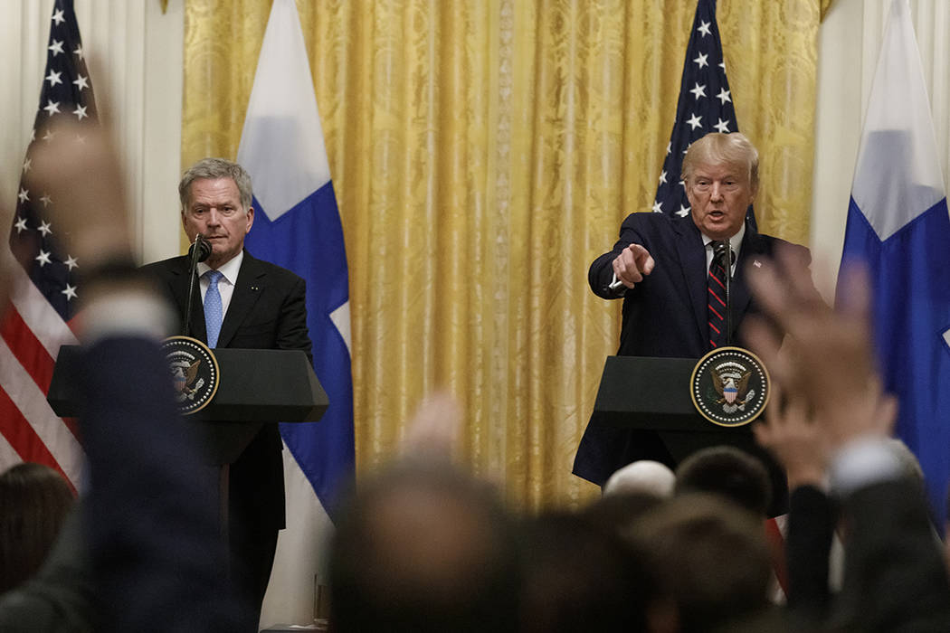 President Donald Trump and Finnish President Sauli Niinisto participate in a news conference at ...