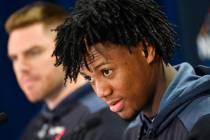 Atlanta Braves outfielder Ronald Acuna Jr., right, and first baseman Freddie Freeman attend a n ...