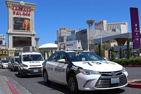 Cab drivers pull into the taxi pick up lane at Caesars Palace hotel-casino in Las Vegas. Gabrie ...