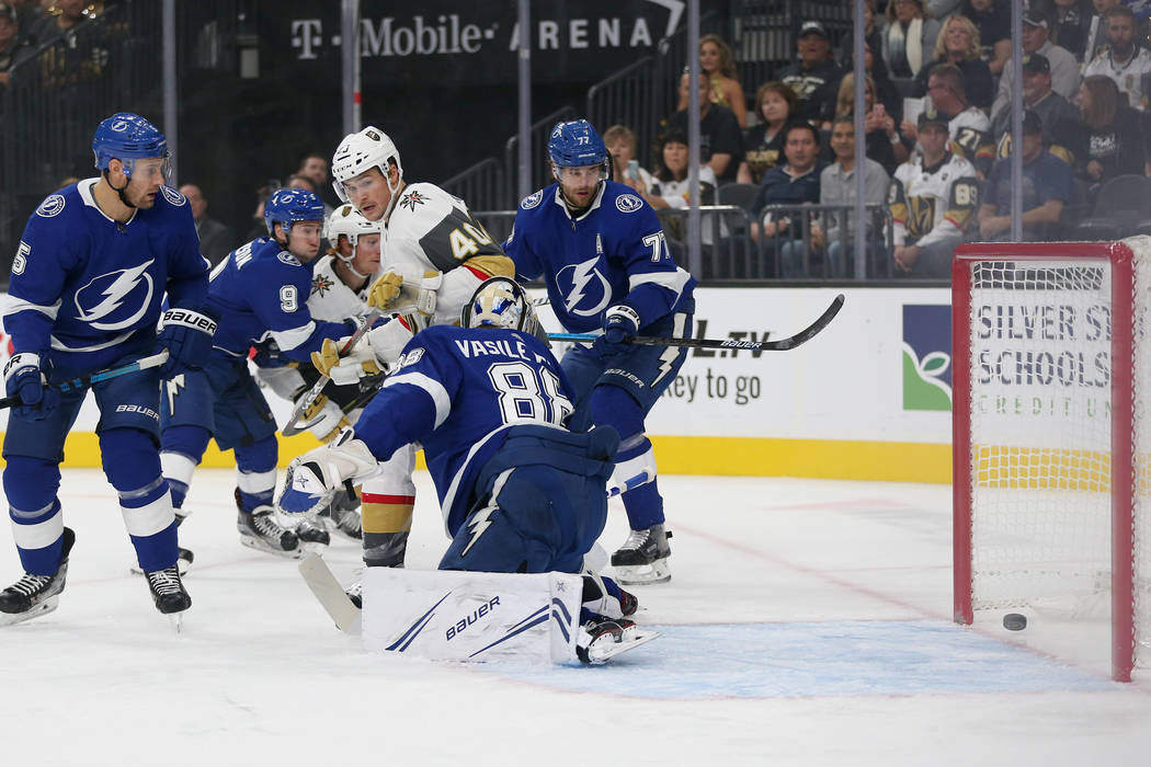 A shot by Vegas Golden Knights defenseman Shea Theodore (27) goes in for a score against Tampa ...