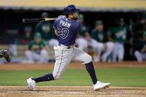 Tampa Bay Rays' Tommy Pham (29) hits a solo home run against the Oakland Athletics during the f ...