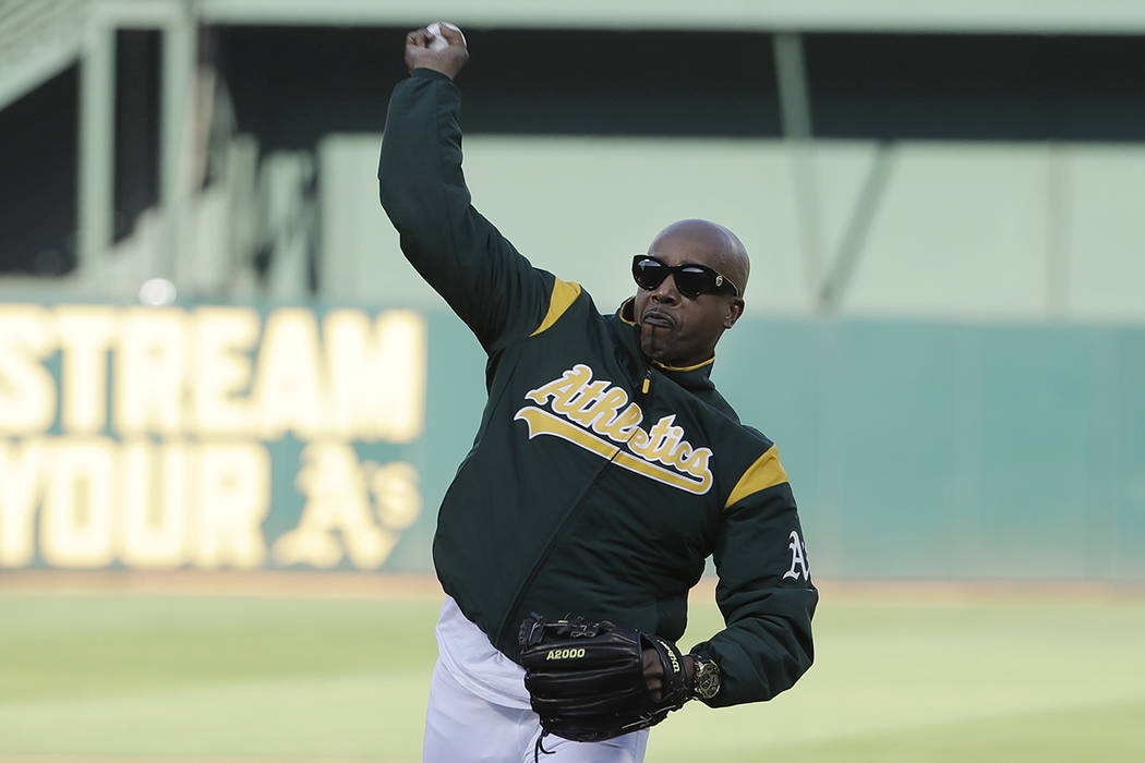 Musician M.C. Hammer throws out the ceremonial first pitch before an American League wild-card ...