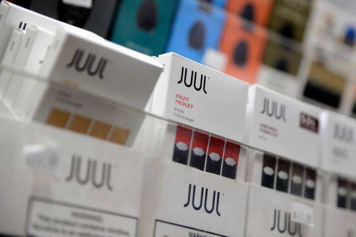 In a Dec. 20, 2018, file photo, Juul products are displayed at a smoke shop in New York. On Thu ...