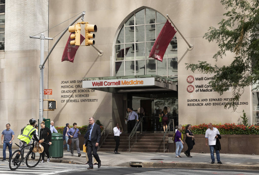 In this Sept. 26, 2019, photo, people pass the Weill Cornell Medicine center in New York. Prest ...