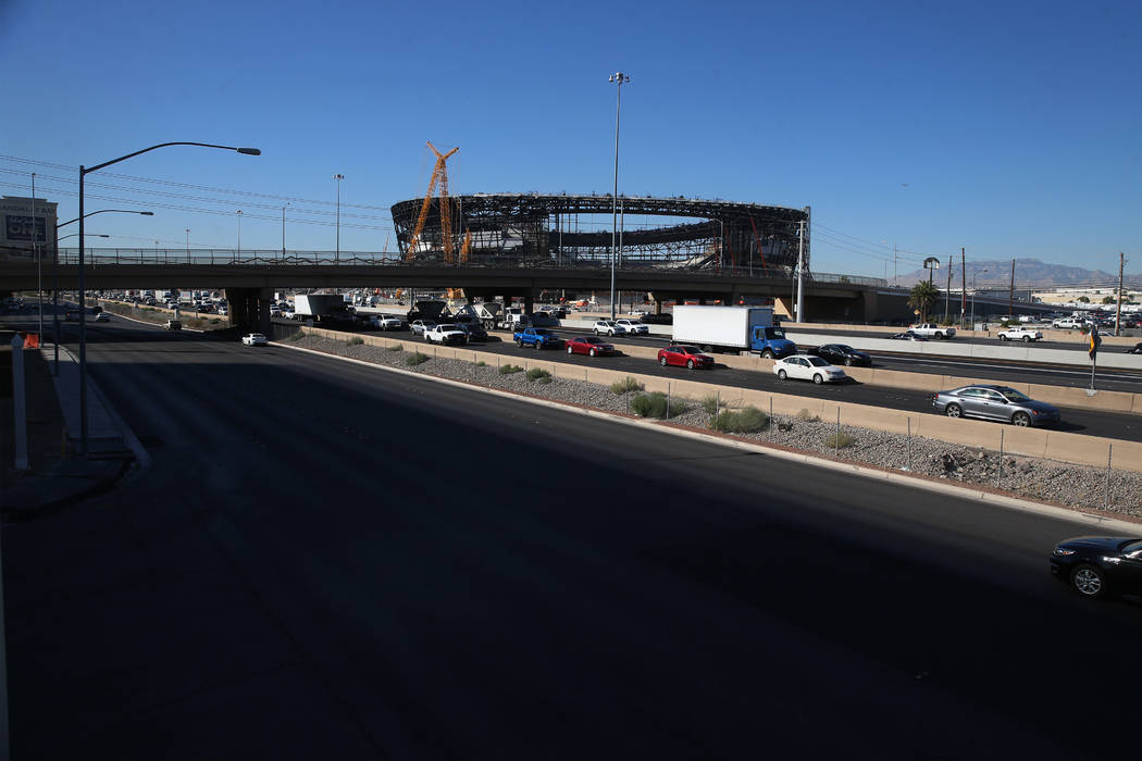 The Hacienda Avenue bridge is seen in front of the Raiders Allegiant Stadium in Las Vegas, Thur ...