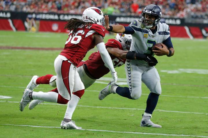 Seattle Seahawks quarterback Russell Wilson (3) during an NFL football game against the Arizona ...