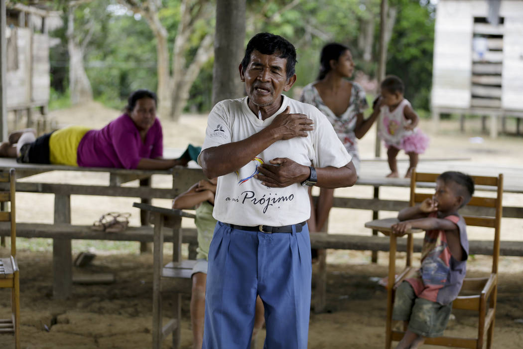 Antelmo Pereira leads a religious class in the indigenous Tikuna village of Santa Rosa, Brazil, ...