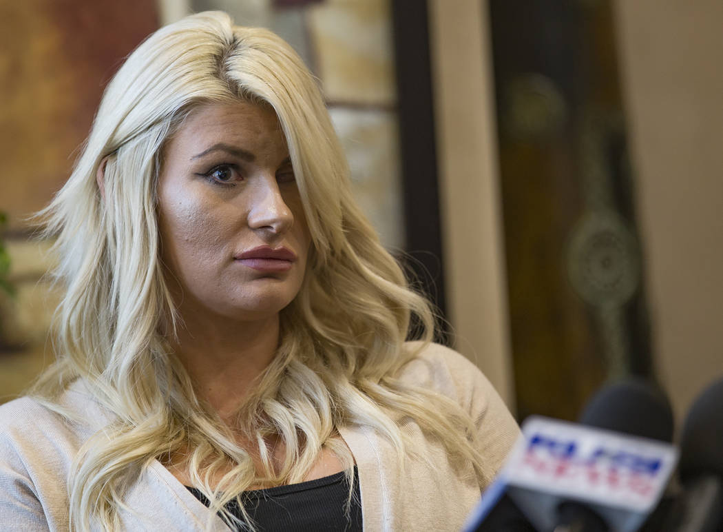 Chelsea Romo, a survivor of the mass shooting in Las Vegas, talks to the media at a news confer ...
