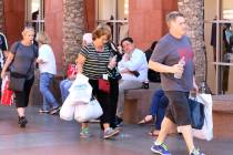 Shoppers walk through Las Vegas North Premium Outlets on Tuesday, Sept. 17, 2019. The outlet ma ...