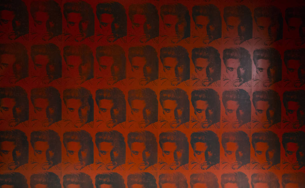 Wallpaper depicting Elvis Presley at the players club lounge area during a tour of the Fertitta ...