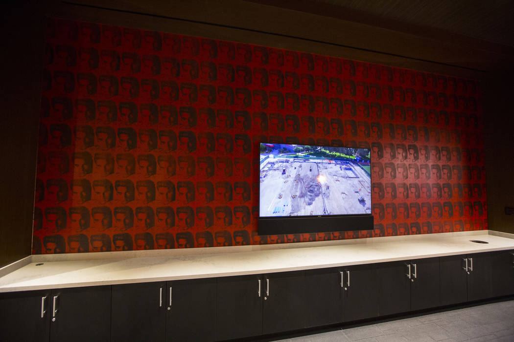 A TV in the players club lounge area is seen during a tour of the Fertitta Football Complex fol ...