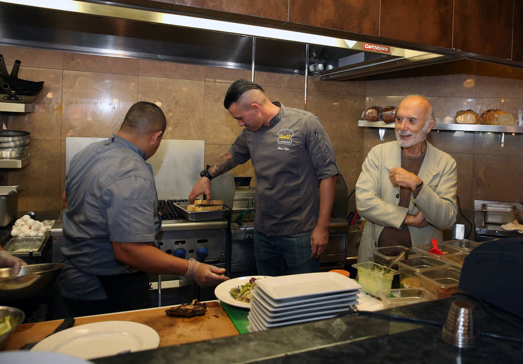 Sami Ladeki, right, owner of Toasted Gastrobrunch, checks out his kitchen at 9516 W. Flamingo R ...