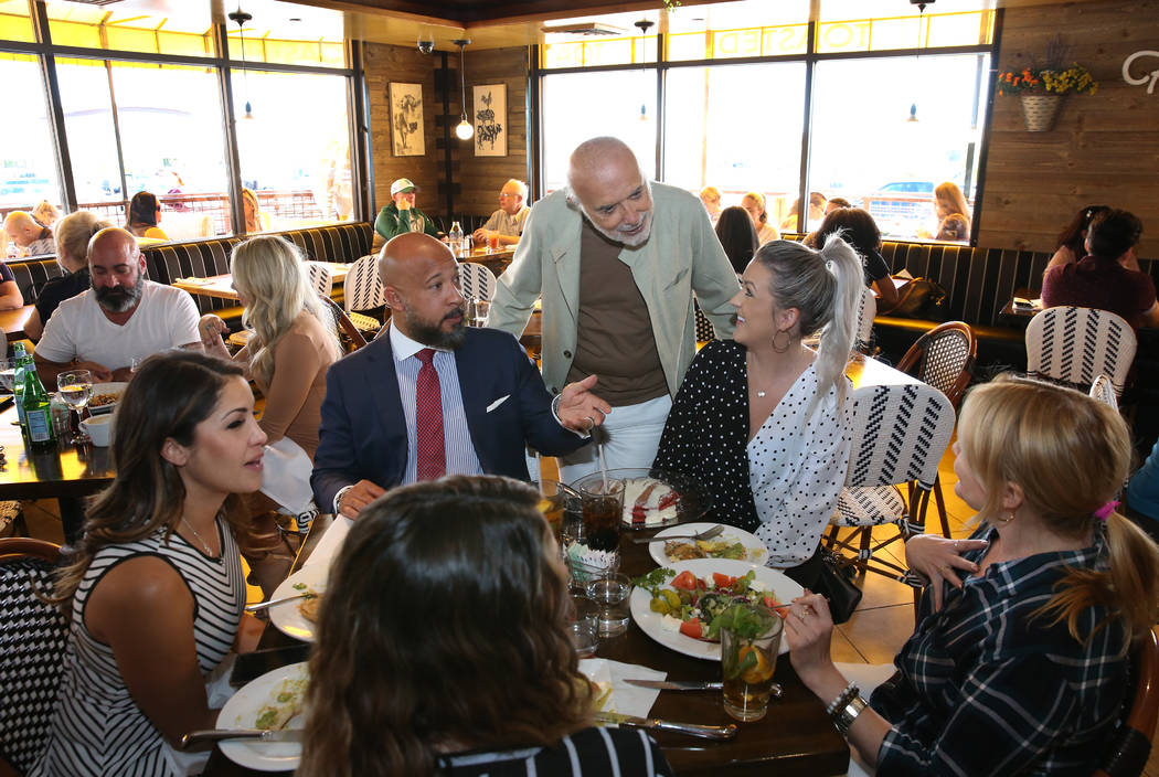 Sami Ladeki, owner of Toasted Gastrobrunch, chats with his customers at 9516 W. Flamingo Road o ...